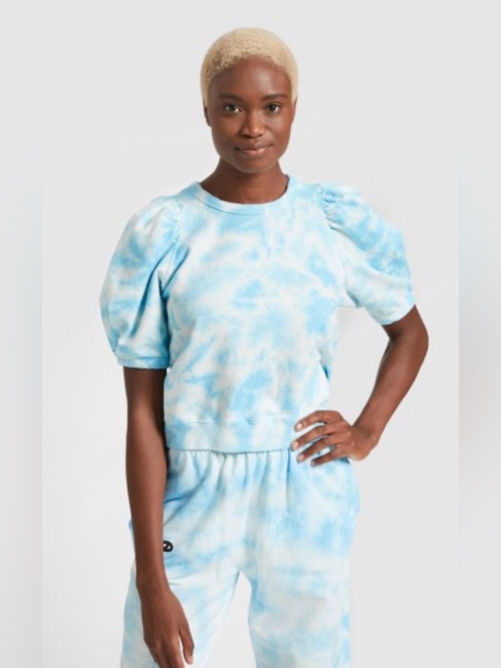 CLARE V.
Light blue tie-dye sweatshirt, size XL.